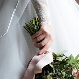 A bride holding flowers